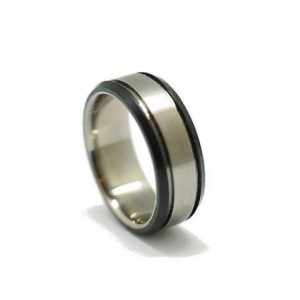 Titanium and black teflon ring